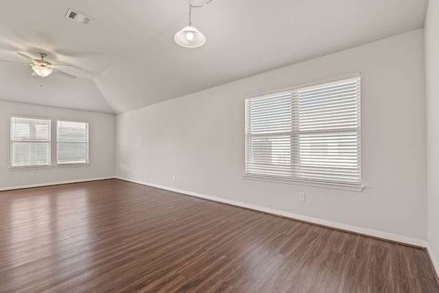 unfurnished room with dark wood-type flooring, ceiling fan, and lofted ceiling