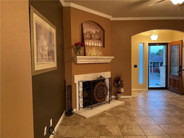 interior space featuring crown molding and tile patterned flooring