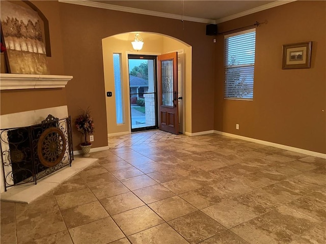 entrance foyer featuring crown molding