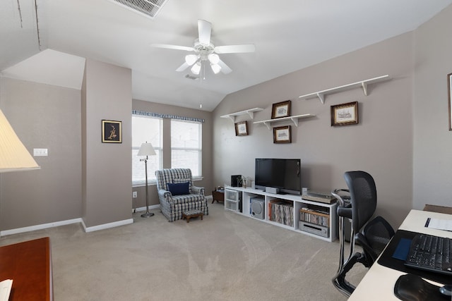 carpeted office featuring lofted ceiling and ceiling fan