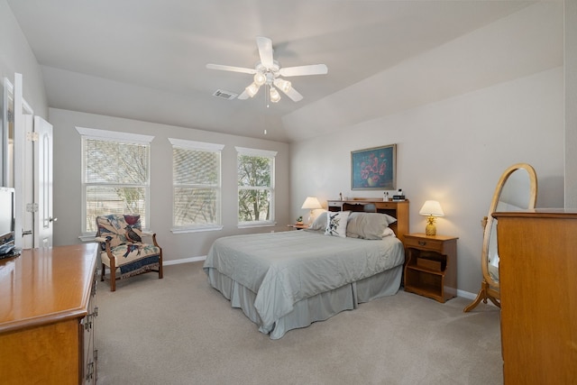 carpeted bedroom featuring lofted ceiling and ceiling fan