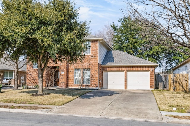 view of front facade with a garage and a front yard