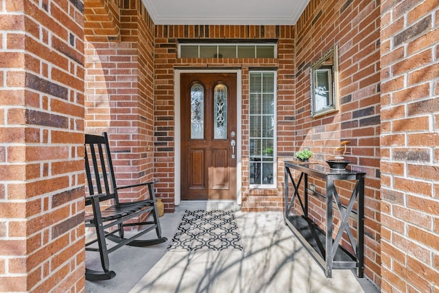 property entrance with covered porch