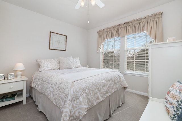 bedroom with light carpet and ceiling fan