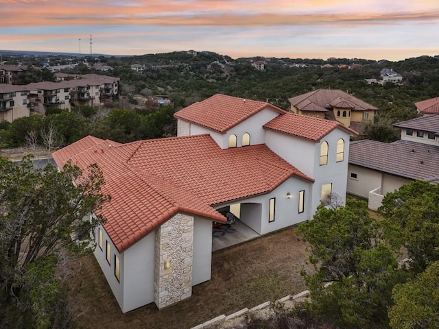 view of aerial view at dusk