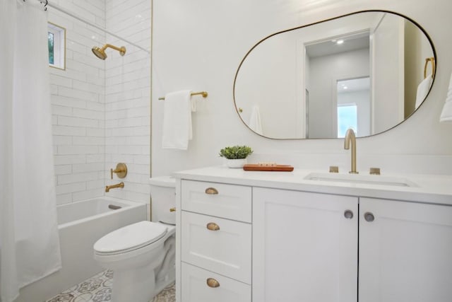 full bathroom featuring vanity, shower / bath combination with curtain, and toilet