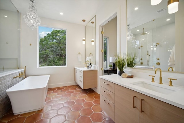 bathroom with vanity, tile patterned flooring, and independent shower and bath