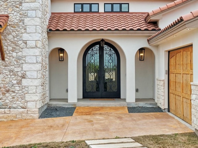 doorway to property with french doors