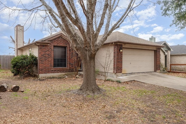 ranch-style home with a garage