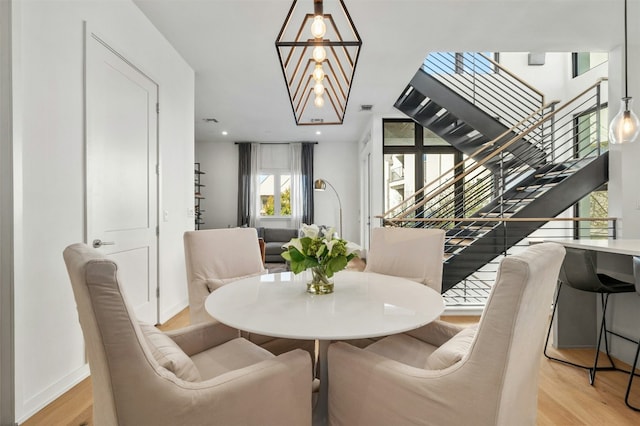 dining room with light hardwood / wood-style flooring