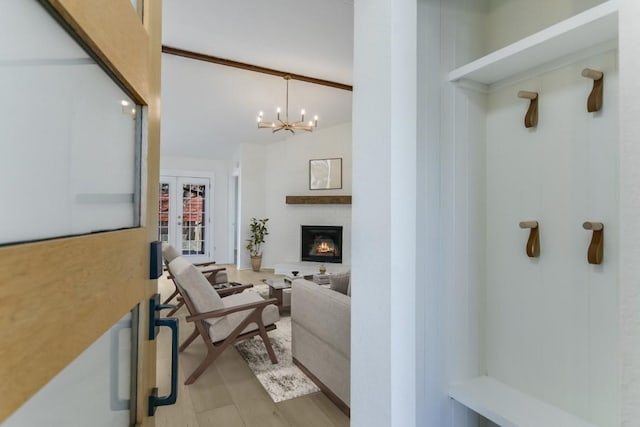 interior space featuring a notable chandelier and light hardwood / wood-style floors