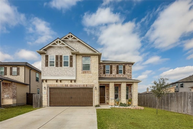 craftsman-style home featuring a garage and a front yard