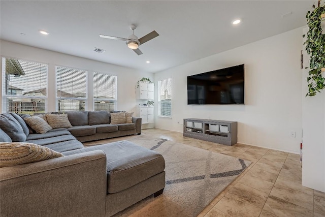 living room featuring ceiling fan