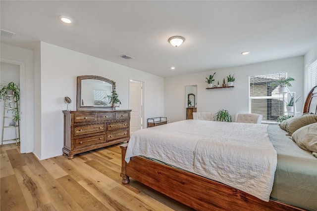 bedroom with light hardwood / wood-style flooring