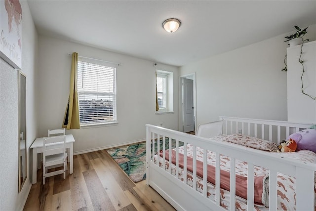 bedroom featuring hardwood / wood-style floors