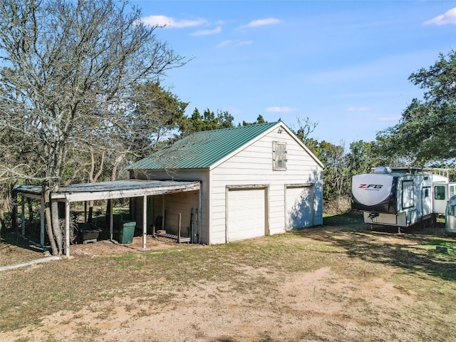 garage with a carport