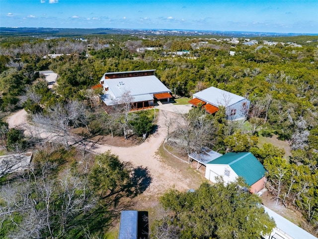 aerial view featuring a view of trees