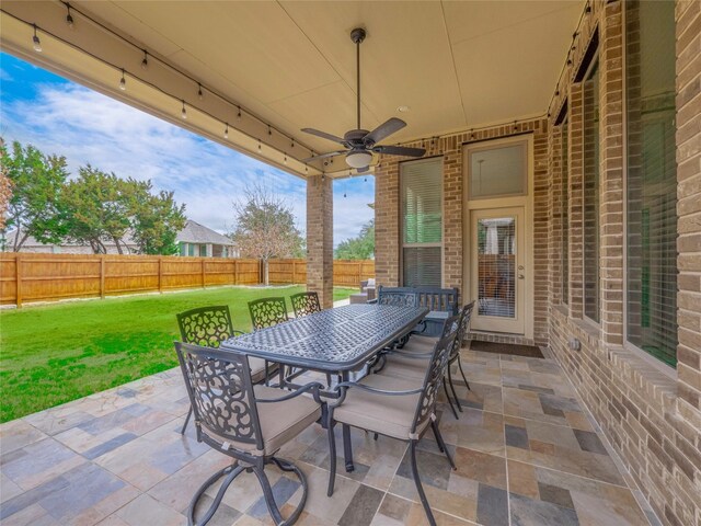 view of patio with ceiling fan