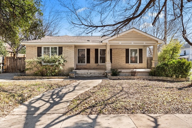 ranch-style house featuring a porch