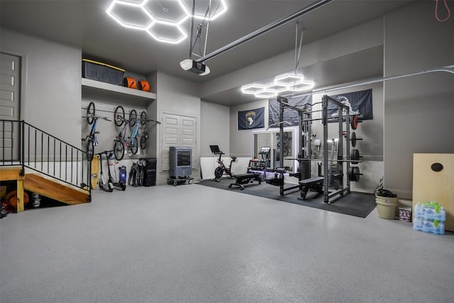 exercise room featuring a garage