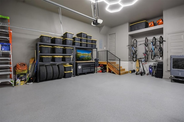 garage with heating unit and a garage door opener