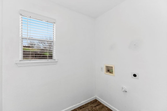 laundry room with dark hardwood / wood-style flooring, hookup for a washing machine, and electric dryer hookup