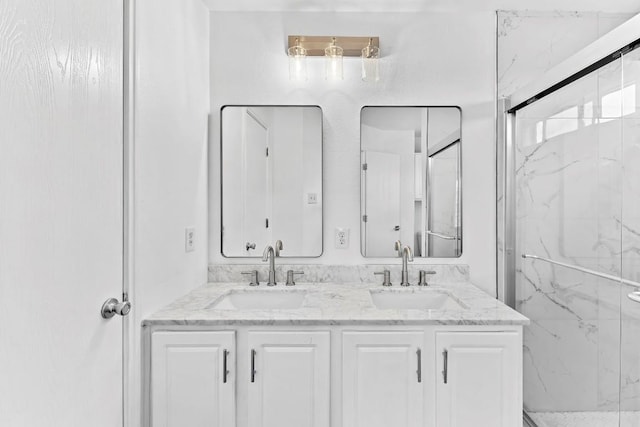 bathroom featuring vanity and walk in shower