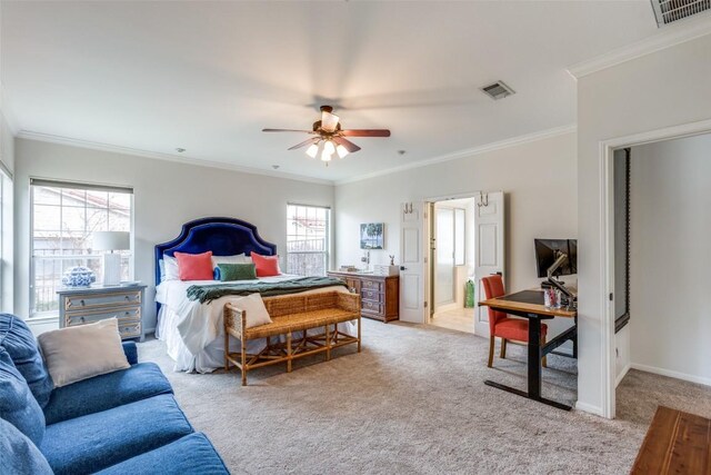 carpeted bedroom with crown molding, connected bathroom, and ceiling fan