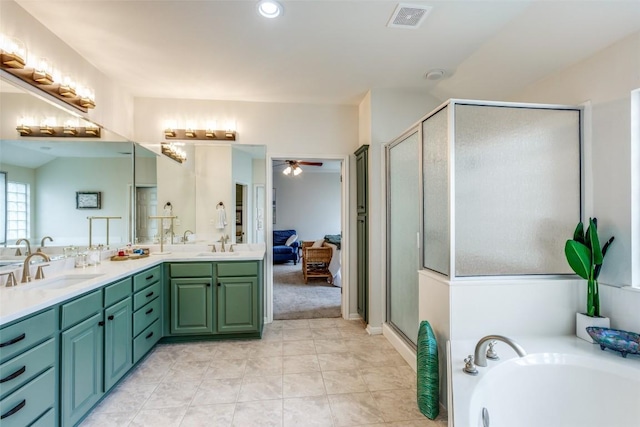 bathroom featuring vanity, tile patterned floors, independent shower and bath, and ceiling fan