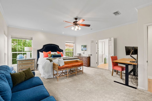 bedroom featuring light colored carpet, ceiling fan, visible vents, and ornamental molding