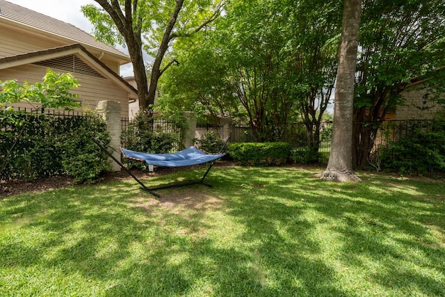 view of yard with fence