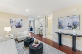 living room featuring dark wood-style floors, baseboards, and recessed lighting