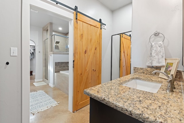 bathroom featuring vanity and independent shower and bath