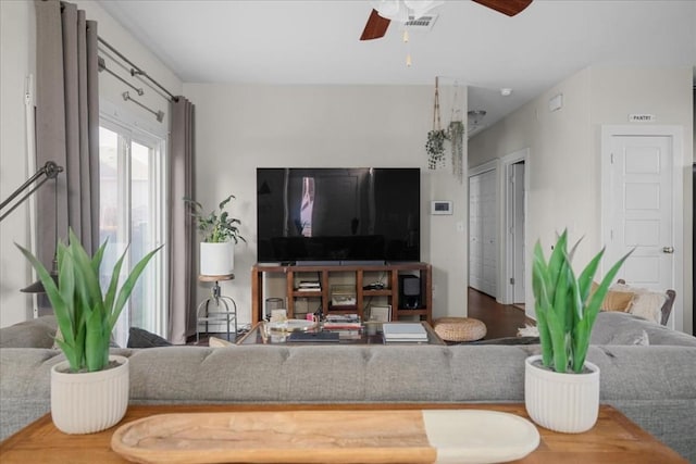 living room featuring ceiling fan