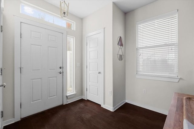 foyer featuring dark wood-type flooring