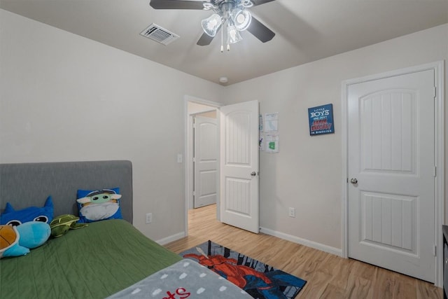 bedroom featuring ceiling fan and light wood-type flooring