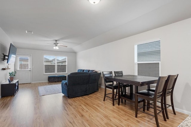 dining area featuring ceiling fan and light hardwood / wood-style flooring