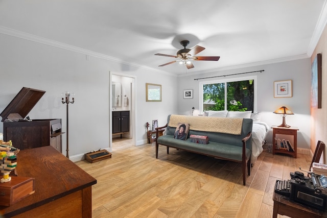 bedroom featuring crown molding, ensuite bath, and light hardwood / wood-style floors