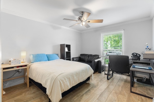 bedroom featuring ornamental molding, ceiling fan, and light hardwood / wood-style flooring