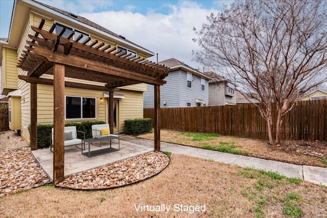 exterior space featuring a pergola and a patio area