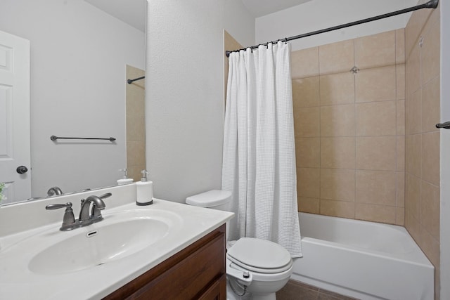 full bathroom with tile patterned flooring, vanity, shower / tub combo, and toilet