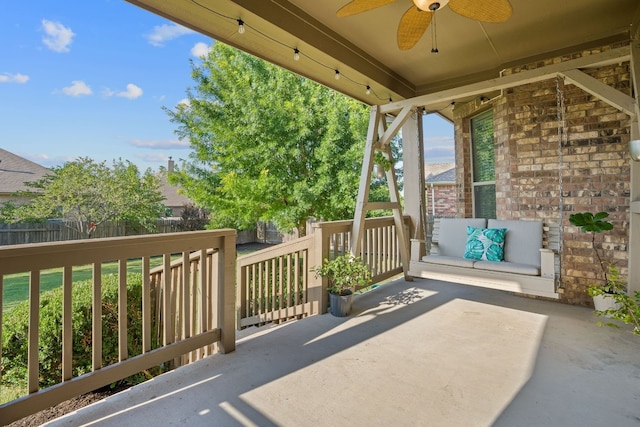 view of patio / terrace featuring ceiling fan