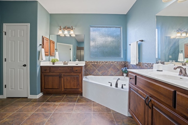 bathroom featuring tile patterned floors, vanity, and independent shower and bath