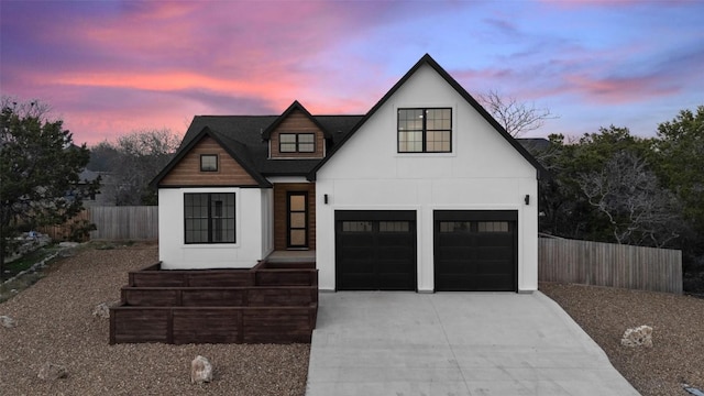 view of front of property featuring a garage