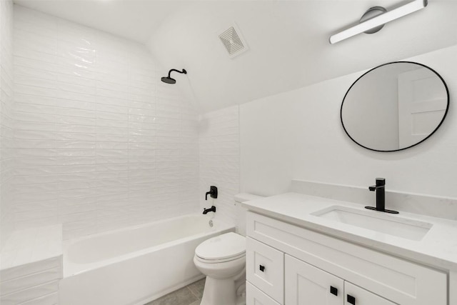 bathroom with visible vents, toilet, shower / washtub combination, vanity, and vaulted ceiling