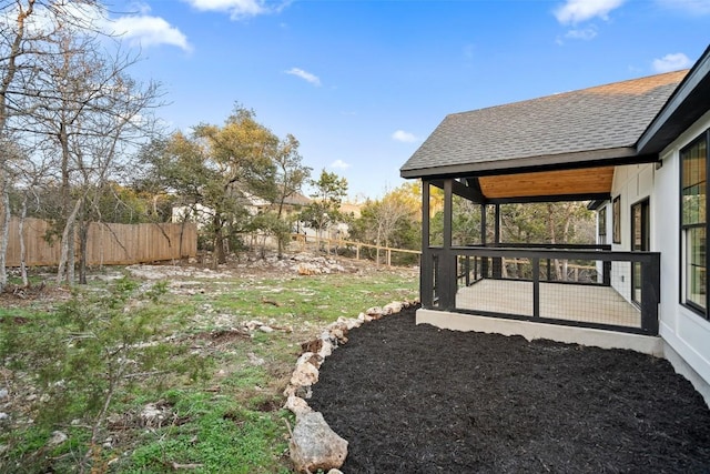 view of yard with fence