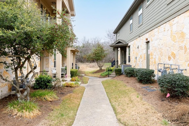 view of yard with central AC