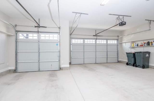 garage featuring a garage door opener