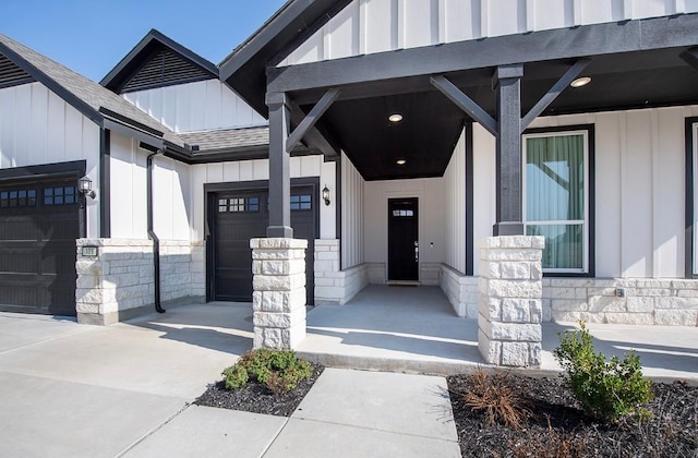 doorway to property featuring a garage