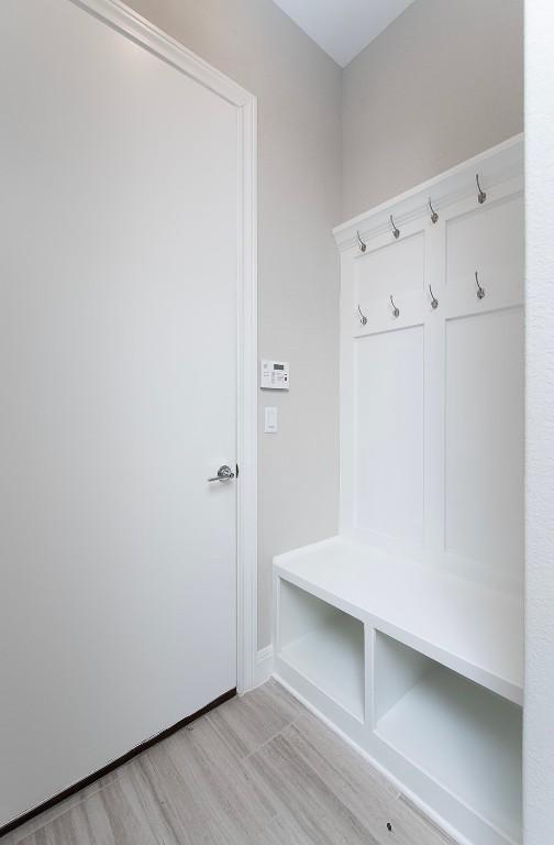 mudroom featuring light wood-type flooring